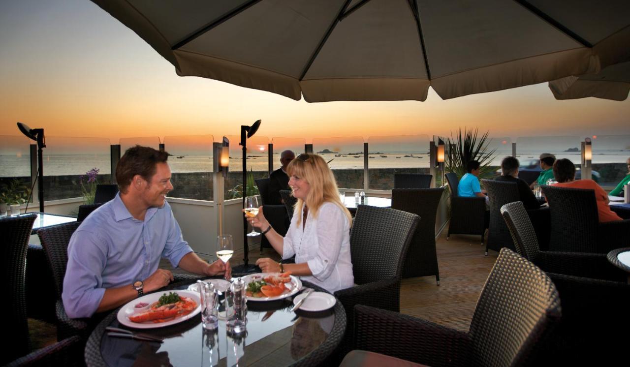 Cobo Bay Hotel Castel Exterior photo
